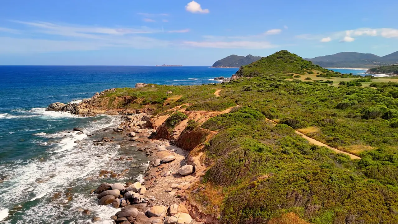 Rocky coastal landscape near Sant’Elmo with sea and narrow paths